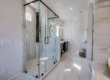 Functional bathroom remodel with built-in shower niche and space-saving features