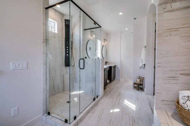Functional bathroom remodel with built-in shower niche and space-saving features